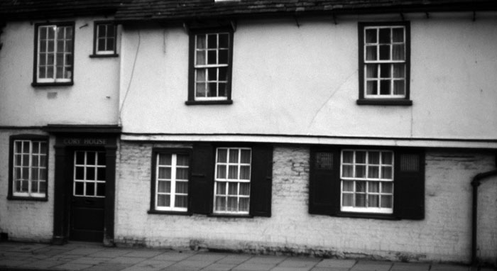Houses with shutters at the windows